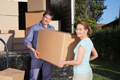 Professional team preparing furniture for office removals in Southharrow